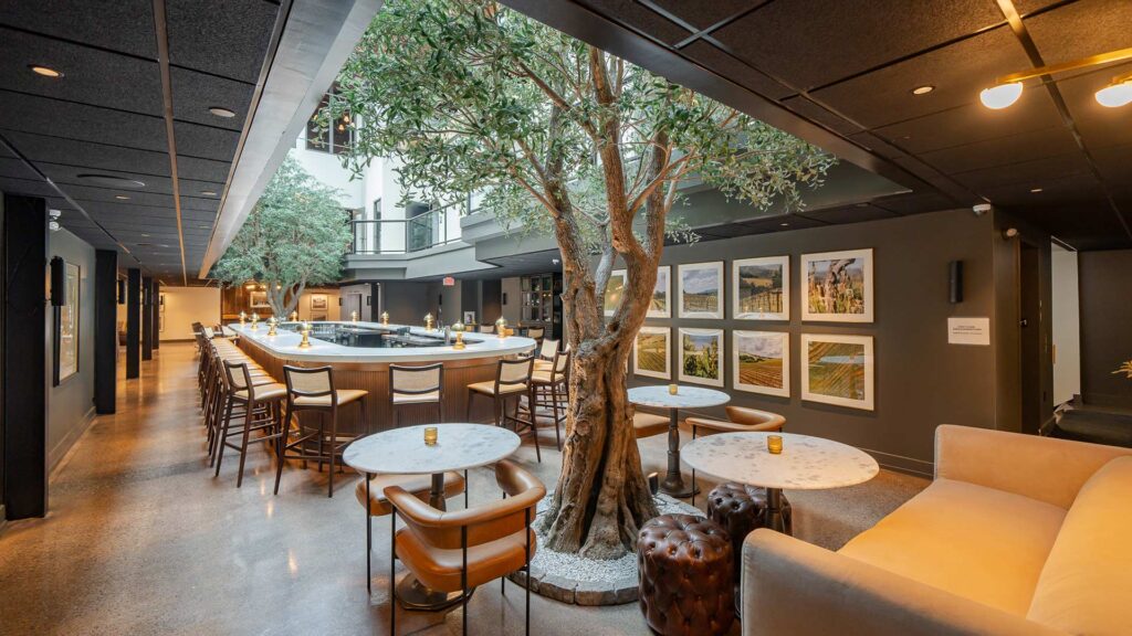 tasting room & wine lounge seating around an indoor tree